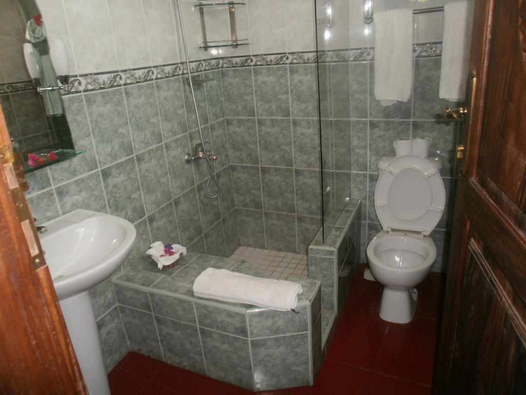 Asmini Palace Hotel Занзибар Номер фото