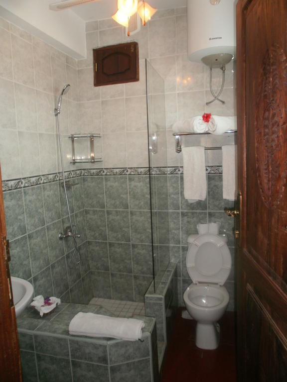 Asmini Palace Hotel Занзибар Номер фото